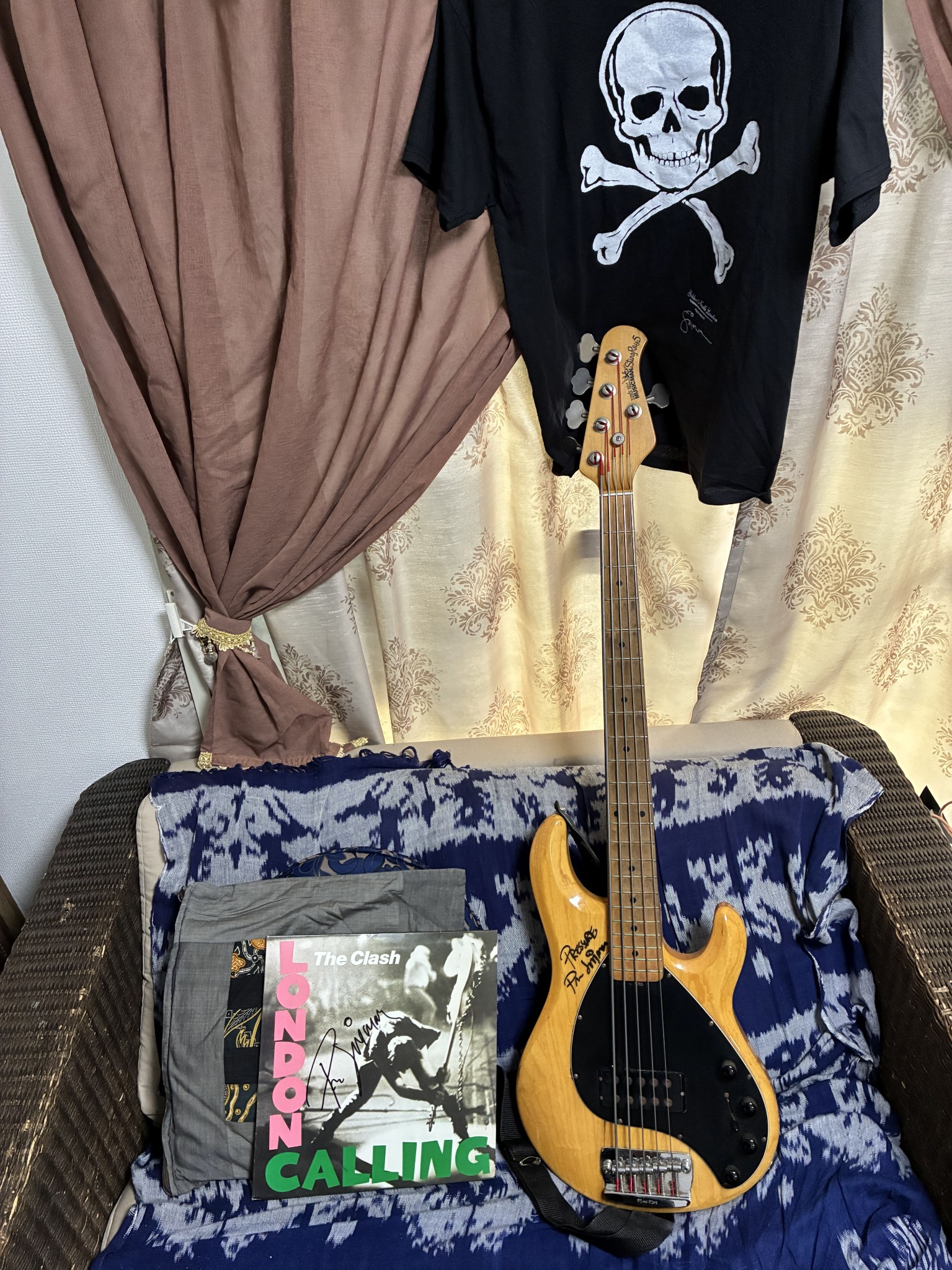 Paul Simonon signed StingRay bass and London Calling record